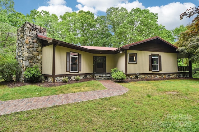 675 Terrys Gap Rd, Hendersonville, NC 28792 - view of front of house featuring a front yard and a chimney