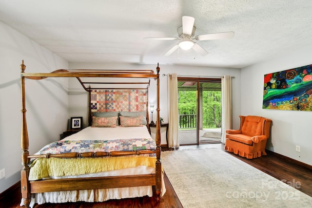 675 Terrys Gap Rd, Hendersonville, NC 28792 - bedroom with access to outside, wood finished floors, baseboards, ceiling fan, and a textured ceiling