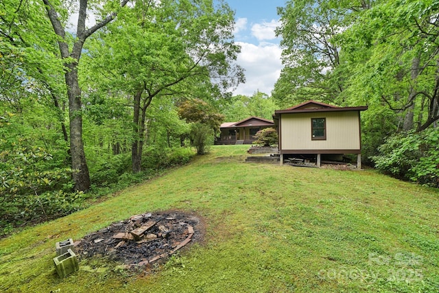 675 Terrys Gap Rd, Hendersonville, NC 28792 - view of grassy yard featuring an outdoor fire pit