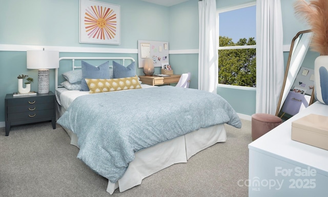 carpeted bedroom with baseboards