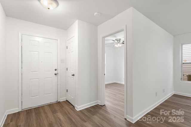 7616 Monarch Birch Ln, Charlotte, NC 28215 - foyer entrance with baseboards and wood finished floors