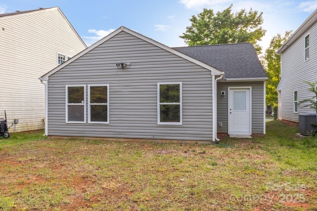 7616 Monarch Birch Ln, Charlotte, NC 28215 - rear view of house with a lawn, a shingled roof, and cooling unit