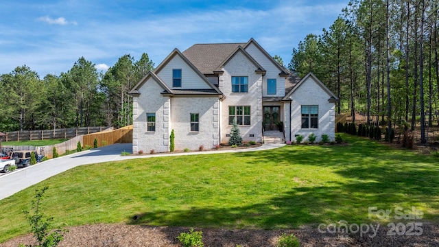 rear view of house featuring driveway