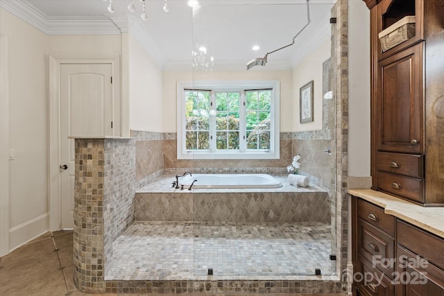 bathroom featuring walk in shower, tile patterned flooring, a garden tub, and crown molding