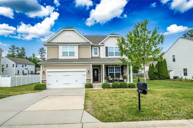 217 Hydrangea Dr, Clover, SC 29710 - craftsman inspired home featuring an attached garage, fence, a front yard, concrete driveway, and a porch