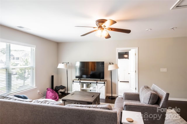 217 Hydrangea Dr, Clover, SC 29710 - living room with ceiling fan, visible vents, baseboards, and wood finished floors