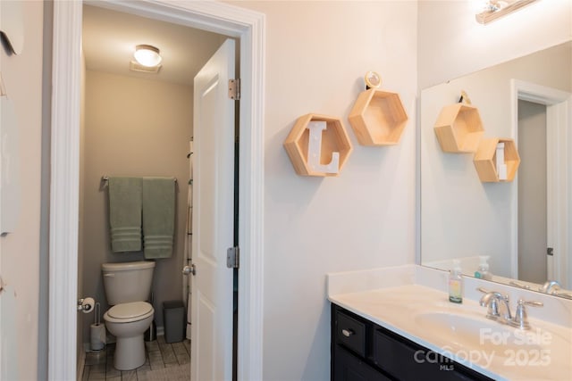 217 Hydrangea Dr, Clover, SC 29710 - bathroom with vanity, tile patterned floors, and toilet