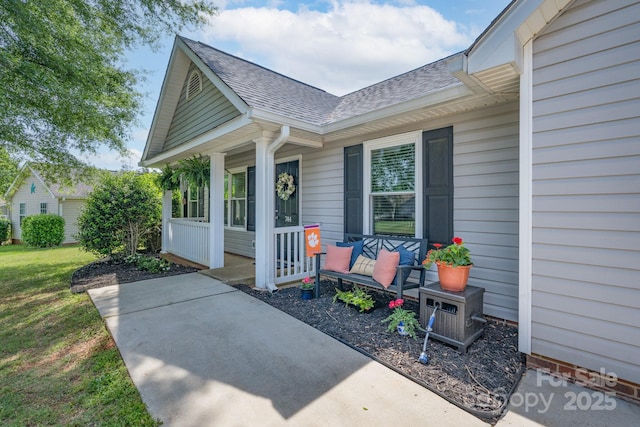 744 Chipmeadow Ln, York, SC 29745 - doorway to property with covered porch, a shingled roof, and a yard