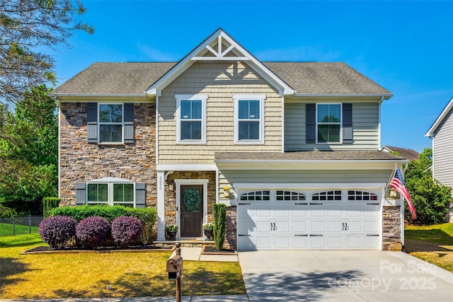 craftsman house featuring concrete driveway, an attached garage, a shingled roof, and stone siding