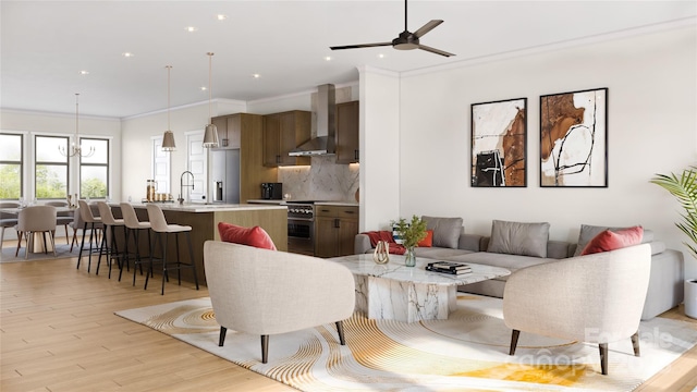 living area featuring crown molding, recessed lighting, light wood-style flooring, and ceiling fan