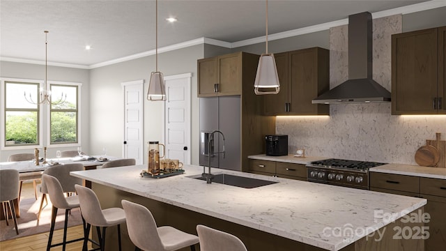 kitchen with wall chimney range hood, backsplash, a kitchen bar, crown molding, and a sink