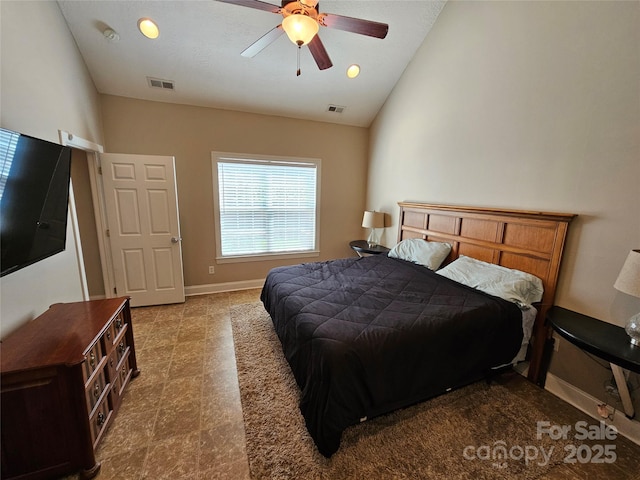 bedroom featuring baseboards, visible vents, ceiling fan, and vaulted ceiling