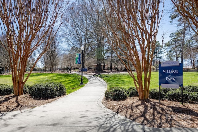 surrounding community with a lawn