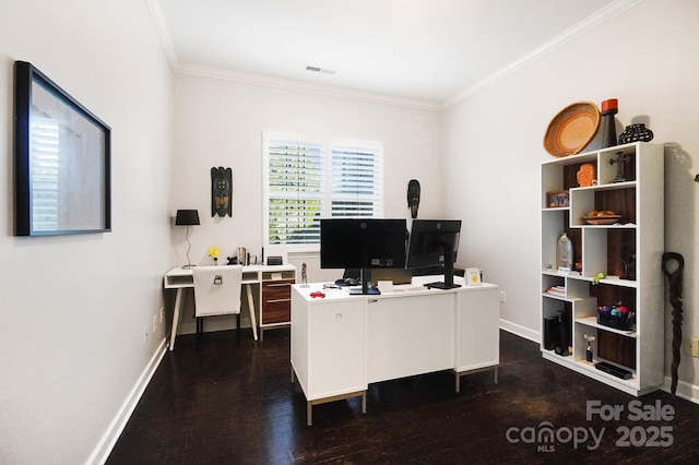 office space featuring dark wood finished floors, visible vents, baseboards, and ornamental molding