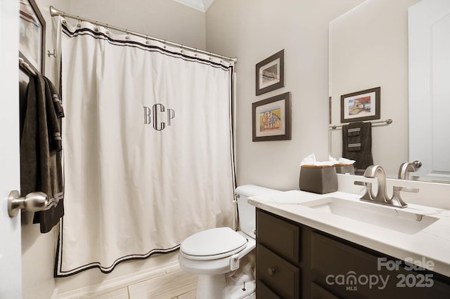 full bathroom with vanity and toilet