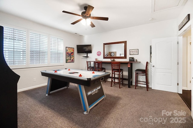 rec room featuring carpet flooring, baseboards, and a ceiling fan