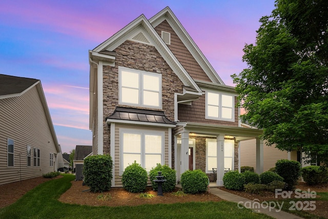 1004 Craven St, Indian Trail, NC 28079 - view of front of house with stone siding and a standing seam roof
