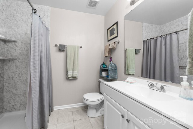 bathroom featuring visible vents, curtained shower, vanity, tile patterned floors, and toilet