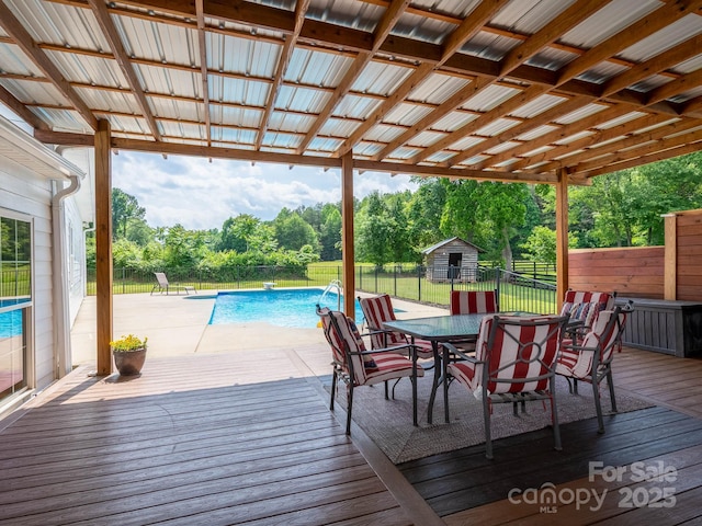 2054 Hickory Hills Dr, Denver, NC 28037 - wooden deck featuring outdoor dining area, a fenced backyard, and view of wooded area