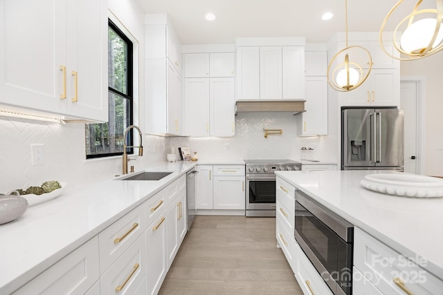 1534 Easy St, Belmont, NC 28012 - kitchen with high quality appliances, a sink, white cabinetry, light countertops, and recessed lighting