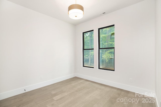 1534 Easy St, Belmont, NC 28012 - spare room with light wood-type flooring and baseboards