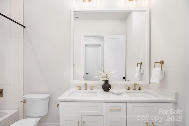 1534 Easy St, Belmont, NC 28012 - bathroom featuring toilet, double vanity, and shower / bathtub combination