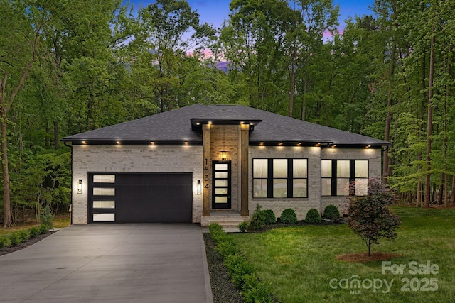 1534 Easy St, Belmont, NC 28012 - view of front of home with concrete driveway, brick siding, an attached garage, and a front lawn