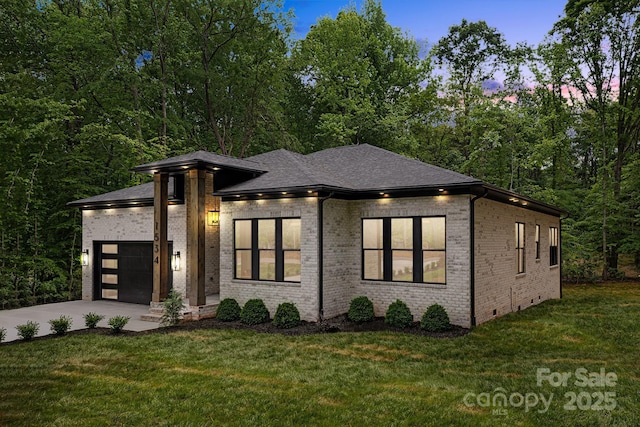 1534 Easy St, Belmont, NC 28012 - view of front of house featuring a garage, concrete driveway, brick siding, a lawn, and roof with shingles