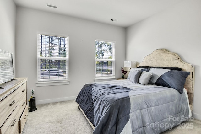 5112 Larewood Dr, Charlotte, NC 28215 - bedroom featuring baseboards, visible vents, and light colored carpet
