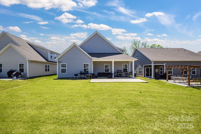 5112 Larewood Dr, Charlotte, NC 28215 - rear view of property with a yard, outdoor lounge area, and a patio area