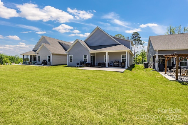 5112 Larewood Dr, Charlotte, NC 28215 - rear view of house with a yard and a patio area