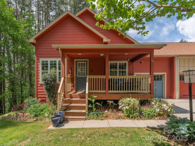 54 Sapling Ln, Waynesville, NC 28786 - view of front of home with a porch and a front yard