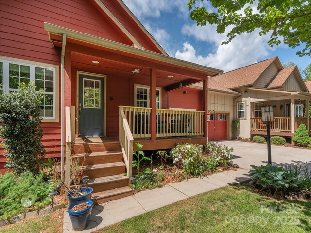 54 Sapling Ln, Waynesville, NC 28786 - view of front of property featuring a porch and concrete driveway