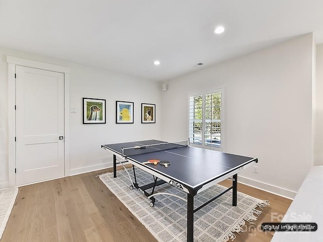 game room with recessed lighting, baseboards, visible vents, and wood finished floors