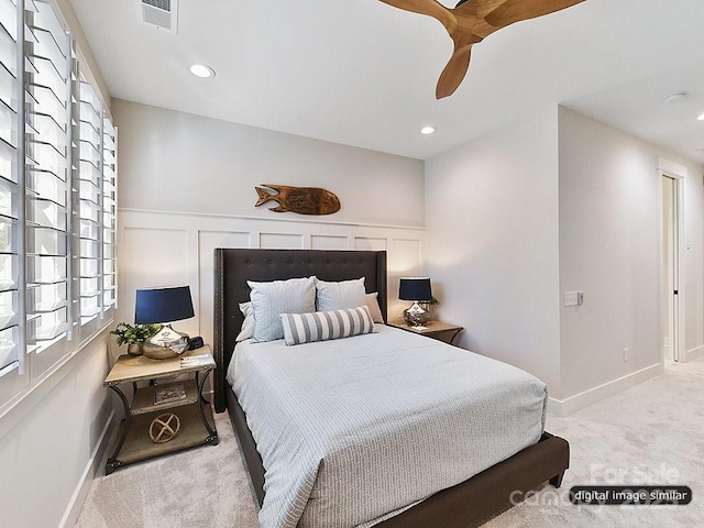 carpeted bedroom featuring recessed lighting, ceiling fan, visible vents, and baseboards