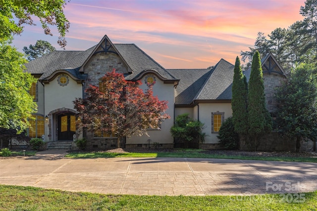 277 Tradition Dr, Mount Gilead, NC 27306 - view of front of house featuring stucco siding and stone siding
