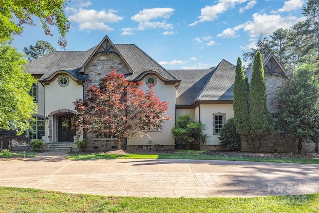 277 Tradition Dr, Mount Gilead, NC 27306 - view of front of property with stucco siding and crawl space