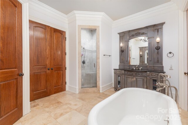 277 Tradition Dr, Mount Gilead, NC 27306 - full bath featuring crown molding, vanity, baseboards, a shower stall, and a soaking tub