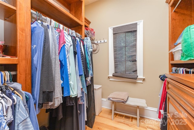 277 Tradition Dr, Mount Gilead, NC 27306 - walk in closet featuring wood finished floors