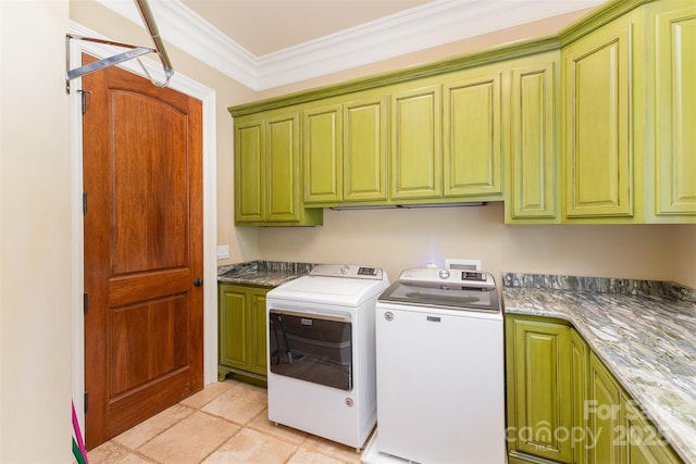 277 Tradition Dr, Mount Gilead, NC 27306 - washroom with crown molding, cabinet space, light tile patterned floors, and washer and dryer