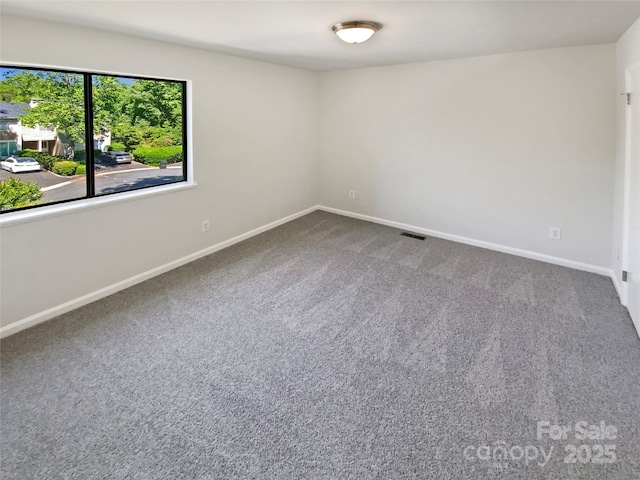 3143 Windbluff Dr, Charlotte, NC 28277 - carpeted spare room featuring baseboards and visible vents