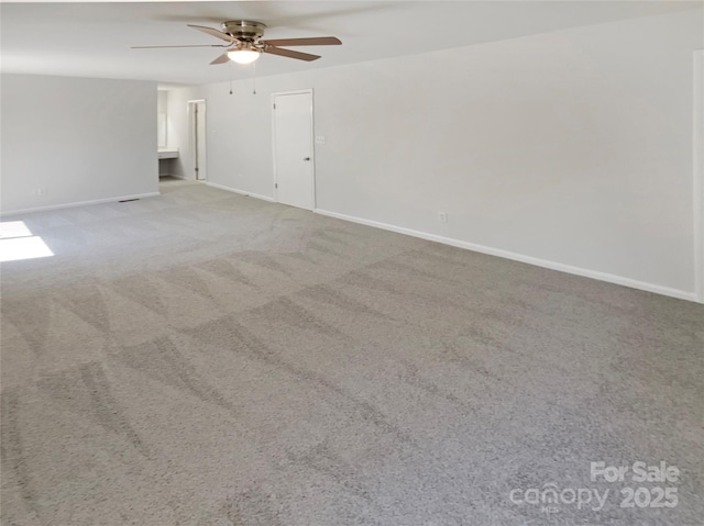 3143 Windbluff Dr, Charlotte, NC 28277 - carpeted empty room featuring baseboards and ceiling fan