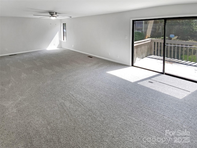 3143 Windbluff Dr, Charlotte, NC 28277 - carpeted spare room featuring baseboards, ceiling fan, and visible vents