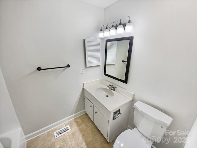 3143 Windbluff Dr, Charlotte, NC 28277 - bathroom featuring visible vents, vanity, toilet, baseboards, and tile patterned floors