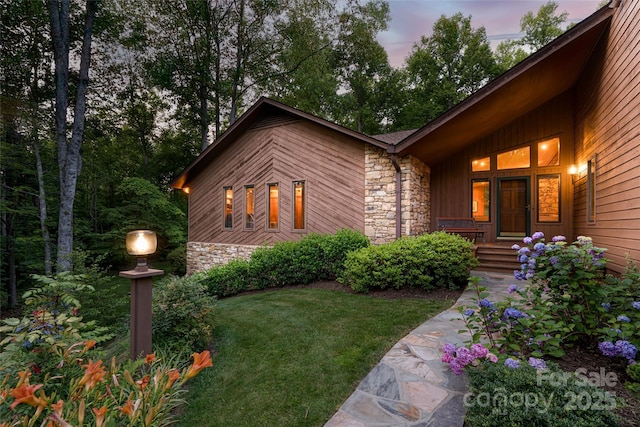 461 Sugar Hollow Rd, Fairview, NC 28730 - view of front of property with stone siding and a yard