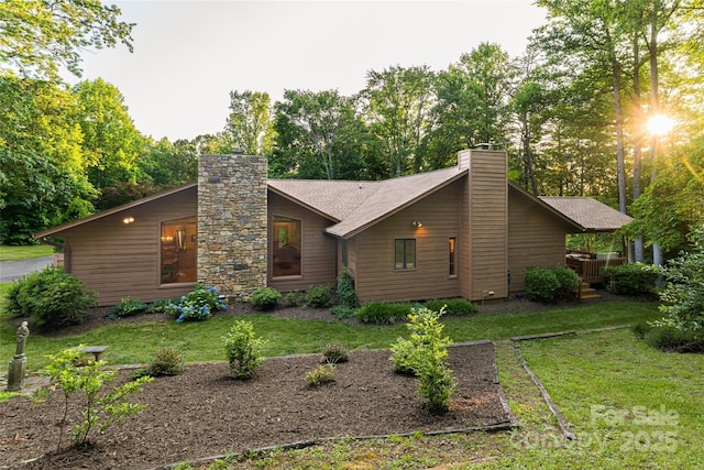 461 Sugar Hollow Rd, Fairview, NC 28730 - view of front of house with a chimney and a front lawn