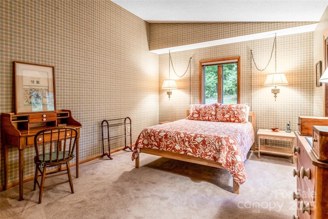 461 Sugar Hollow Rd, Fairview, NC 28730 - carpeted bedroom with wallpapered walls and vaulted ceiling