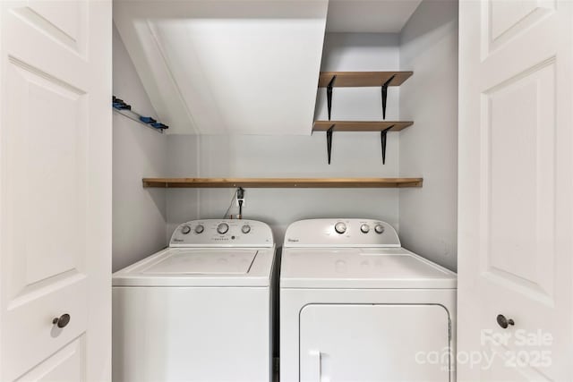 clothes washing area with washer and dryer