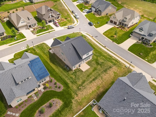 drone / aerial view with a residential view