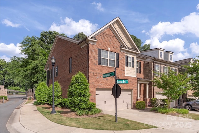 5422 Shannon Bell Ln, Charlotte, NC 28277 - view of front of property featuring a garage, concrete driveway, and brick siding